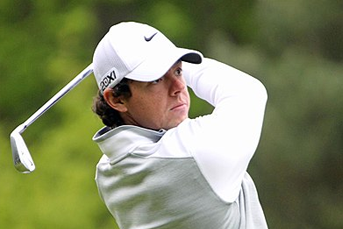 Rory McIlroy finishes a long iron shot